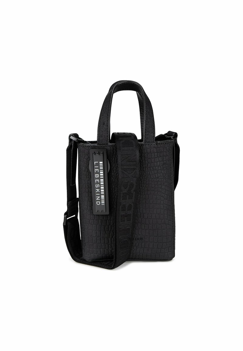 Petit sac à main noir texturé avec doubles poignées, longue bandoulière réglable, et une étiquette portant la mention "LIEBESKIND" sur fond blanc.