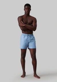 Calvin Klein Swimwear MEDIUM DRAWSTRING - Zwemshorts - faded denim