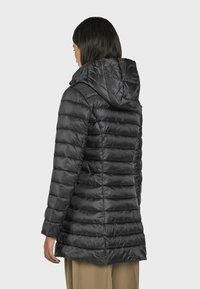 Black puffer coat with a hood, featuring horizontal quilted pattern, smooth texture, and a slightly longer cut.