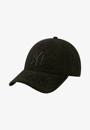 Schwarze Kappe aus strukturiertem, fusseligem Material mit einem gebogenen Schirm. Verfügt über ein gesticktes New York Yankees-Logo in passender Farbe.