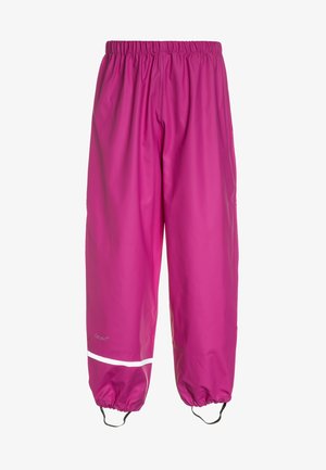 Lyserøde vandtætte bukser med elastisk talje, snore ved anklerne og reflekterende hvide striber på benene. Glat, blank tekstur.