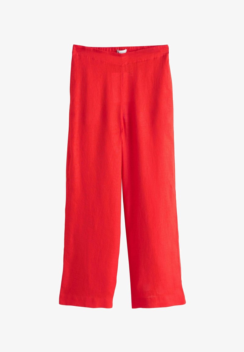 Pantalon large en lin rouge avec une taille élastique, design sans coutures et texture légèrement froissée, offrant une coupe décontractée et ample.
