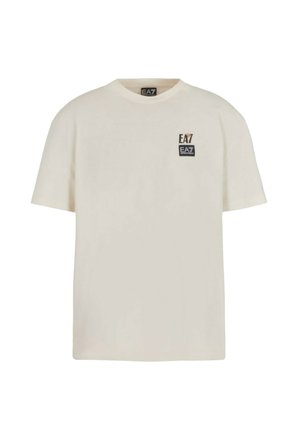 T-shirt à manches courtes blanc cassé avec un col rond et un petit logo noir EA7 Emporio Armani sur la poitrine gauche.
