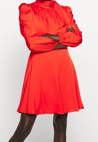 Milly Koktejlové šaty / šaty na párty - red