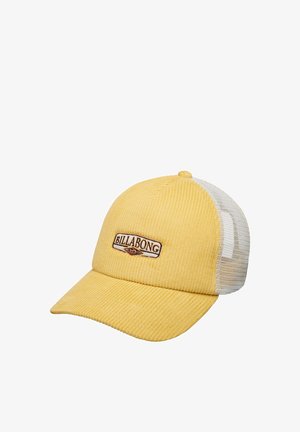 Gele ribfluwelen pet met witte mesh achterkant en Billabong-logo op de voorkant.