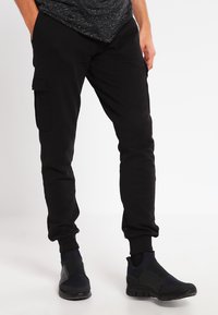 Urban Classics - CARGO  - Donji dijelovi trenirke - black Minijatura 1