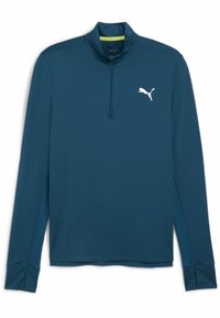 Ilgomis rankovėmis, mėlynas puloveris su ketvirčio užtrauktuku, su baltu Puma logotipu ant krūtinės ir tekstūruoto audinio akcentais šonuose.
