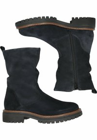 Mustat samettiset nilkkurit, joissa on pyöristetty kärki, sivuvetoketju ja paksu kumipohja, jossa on teksturoitu pinta ja kontrastivärinen ompelu.