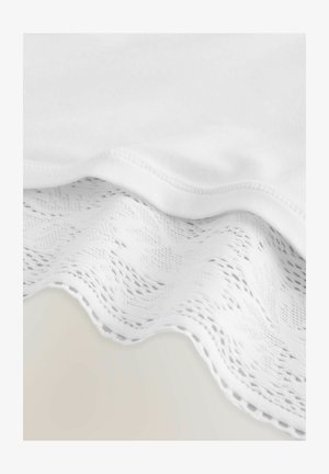 White fabric featuring a textured lace edge with a wavy pattern, contrasted with a smooth inner layer, showcasing a delicate design.