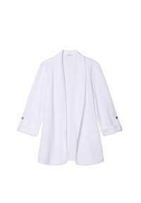 Blazer léger blanc avec un design fluide, manches longues pouvant être retroussées, et boutons décoratifs aux poignets. Texture de tissu lisse.