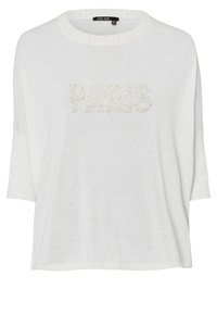 White loose-fit sweater with short sleeves and ribbed neckline, featuring "PARIS" in textured, pearl-like accents. Soft, lightweight material.