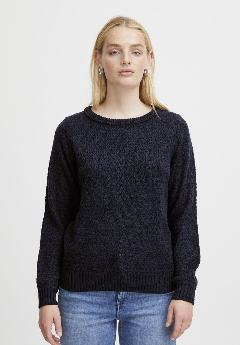Dunkelblauer strukturierter Pullover mit Rundhalsausschnitt, langen Ärmeln und gerippten Bündchen sowie Saum. Weiches Strickmaterial mit einem subtilen Muster.