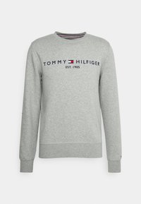 Grijze sweatshirt gemaakt van een katoenmix, met een ronde hals, lange mouwen en geborduurd 'TOMMY HILFIGER EST. 1985' logo op de voorkant.