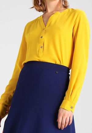 Pusero - dark yellow