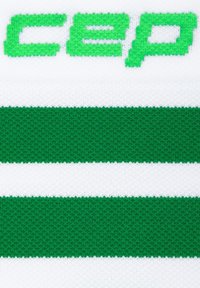 Prodotto CEP con strisce verdi e bianche in una texture a maglia; presenta la scritta "cep" in evidenza in verde.