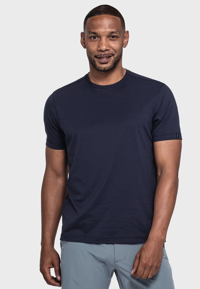 Marineblaue Kurzarm-T-Shirt aus glattem Stoff mit Rundhalsausschnitt und dezentem Logodetail am Ärmel. Gerader Schnitt.
