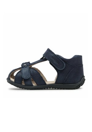 Sandale bleu marine pour tout-petit avec talon fermé, bout ouvert, brides réglables, décoration florale et semelle texturée.