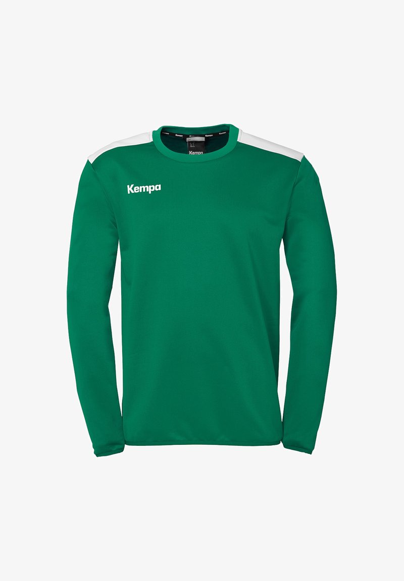 Groene sportieve longsleeve met witte schouderaccenten, met een ronde hals en het "Kempa"-logo op de borst. Glad stoftextuur.