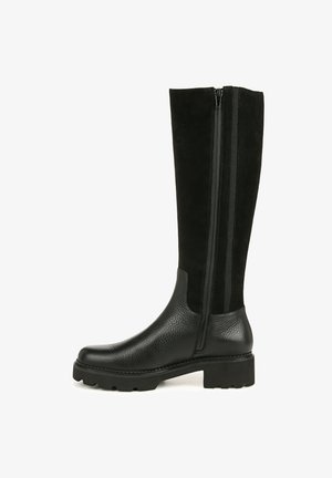 Bottes noires montantes en cuir verni au niveau des orteils et tige en daim texturé, avec une fermeture éclair sur le côté et une semelle en caoutchouc pour l'adhérence.