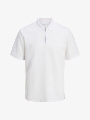 Λευκό πόλο μπλουζάκι από υφασμάτινο βαμβάκι, διαθέτει φερμουάρ, κοντά μανίκια και γιακά. Διακριτική σήμανση στην αριστερή πλευρά του στήθους.