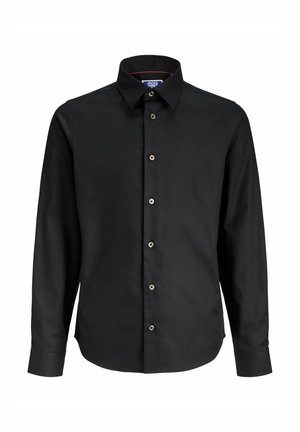 Chemise noire à manches longues en coton, avec col boutonné, boutons sur le devant et ourlet arrondi. Texture lisse avec un léger éclat.