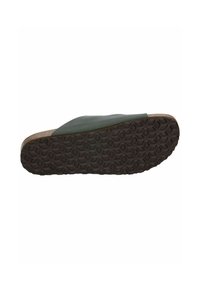 Cork sole sandal with dark green upper, featuring a smooth texture and an embossed honeycomb pattern on the outsole for grip.