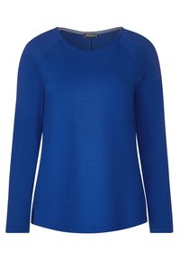 Blå långärmad topp med rund halsringning, gjord av mjukt tyg, med raglanärmar och en något utsvängd nederkant.