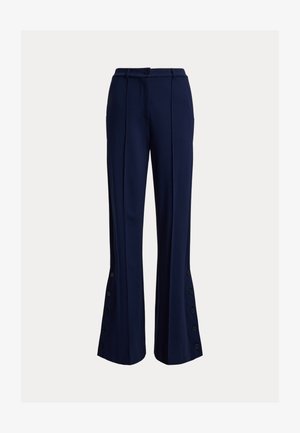 Marineblaue, maßgeschneiderte Hose mit vorderen Bügelfalten, knopfleistentem Bund und Knopfdetails entlang der ausgestellten unteren Hosenbeine.