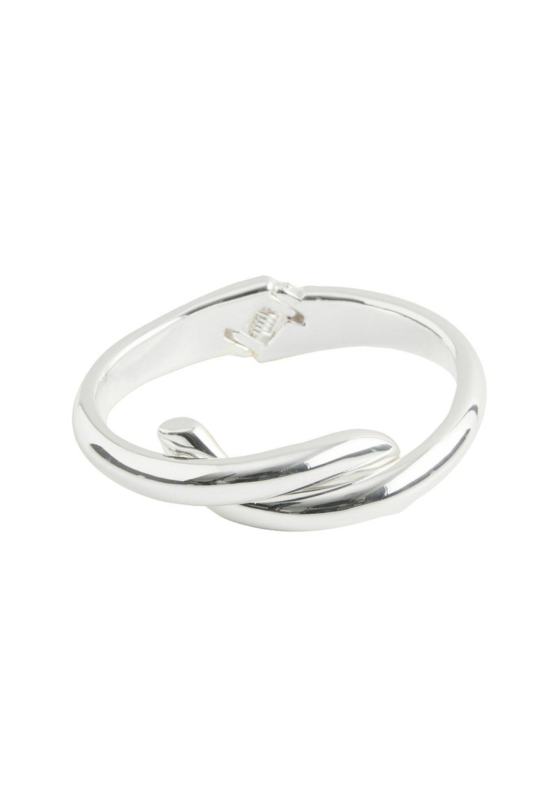 Silver bracelet featuring a twisted design with a smooth, polished finish and a secure clasp. Minimalist and contemporary shape.