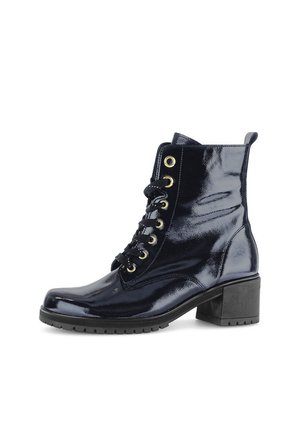 Navy patent leather ankle boots with a chunky heel, gold eyelets, lace-up front, and a textured black sole for grip.