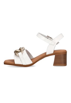 Sandalia de cuero blanco con diseño anudado, hebilla ajustable en el tobillo y tacón de bloque de madera de altura media. Textura suave con suela plana.
