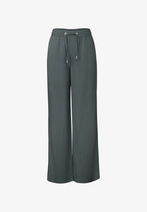 Keve súlyú, bő legszerű nadrág sötétszürke színben, húzózsinórral ellátott derékkal. Simlékeny, puha anyagból készült, tiszta varrásokkal és zsebek nélkül.