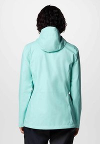 Giacca leggera verde menta con cappuccio, caratterizzata da una texture liscia, un design aderente e un orlo curvo sul retro.