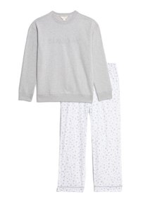 Sweatshirt gris avec le texte "SUNDAY", associé à un pantalon de pyjama blanc avec un motif gris subtil. Les deux sont en tissu doux et léger.