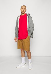 Tommy Hilfiger TEE - T-shirt básica - primary red