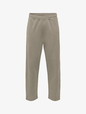 Joggers taupe clair avec une taille élastique, coupe décontractée et texture douce. Ils présentent une coupe droite aux jambes et des coutures cousues.
