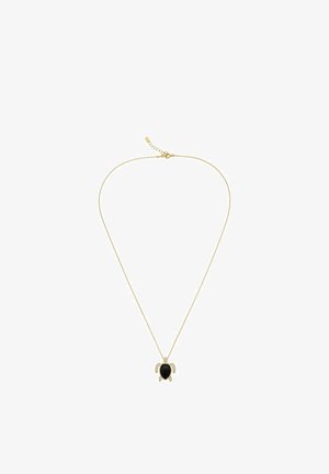 Collier chaîne en or avec pendentif en forme de tortue, ornée d'une pierre noire facettée et de petites cristaux clairs sur les pattes.