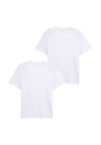 Zwei schlichte weiße T-Shirts aus weicher Baumwolle, mit kurzen Ärmeln und Rundhalsausschnitt, vor einem neutralen Hintergrund präsentiert.