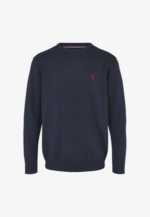 Tumed sinaine kudumüts, mis on valmistatud puuvillast, ümmarguse kaelusega, soonikkoes varrukate otsad ja väike punane logo aksent vasakul rinnal.