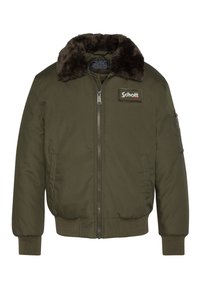 Oliven grøn bomberjakke med et faux fur-krave, ribbede mansjetter og kant, samt en frontlynlås og en sidelomme. Schott-logo patch.
