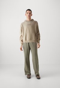 Redefined Rebel Hoodie - string