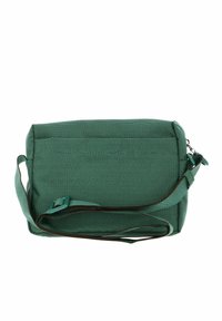 Sac bandoulière en textile vert avec une surface texturée, de forme rectangulaire, doté d'une sangle ajustable et d'une fermeture éclair.