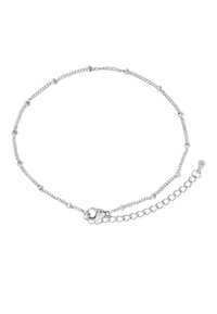 Anklet in argento con piccole perline rotonde, dotata di chiusura a gancio e catena di estensione regolabile. Design liscio e delicato.