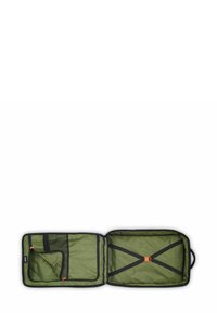 Borsa da viaggio verde realizzata in materiale resistente. Presenta un scomparto con zip, una tasca in rete e spallacci regolabili. L'interno ha una texture a motivo.