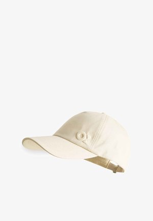 Casquette de baseball beige en coton avec une visière courbée et un petit logo brodé à l'avant, dotée d'une sangle ajustable à l'arrière.