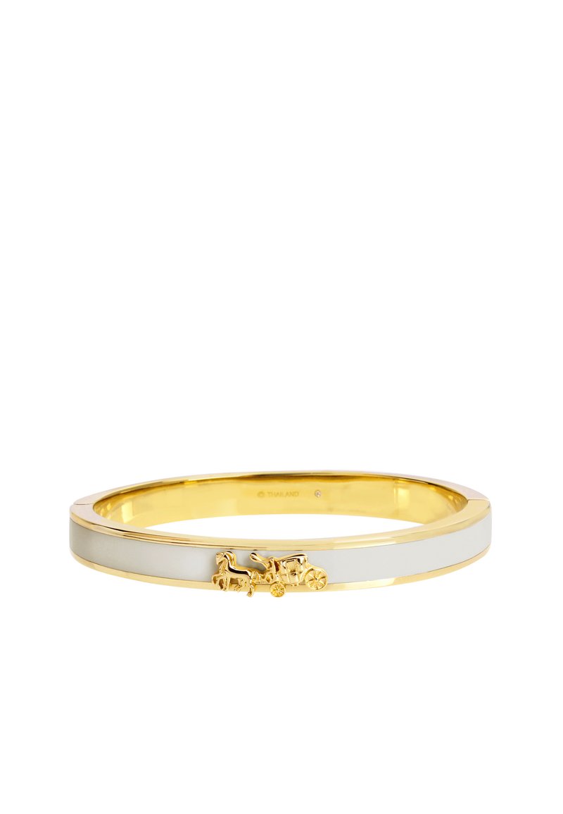 Gold bangle with white enamel inlay, featuring a raised horse and carriage design. Smooth finish, oval shape, elegant and lightweight.