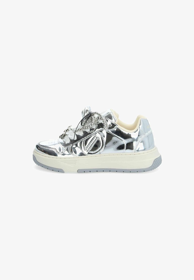 Metallic silver sneaker with round toe, rubber sole, decorative accents, and contrasting cream-colored collar. Features intricate detailing on upper.