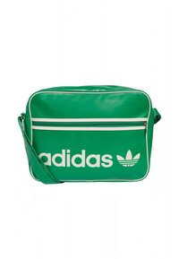 Grønn syntetisk skulderveske med en stor hvit adidas-logo og et Trefoil-emblem, med en hvit glidelåslomme og kontrasterende kant.