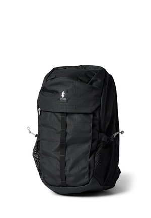 Black Cotopaxi backpack with front flap, side mesh pockets, and logo featuring a llama silhouette on the upper front.