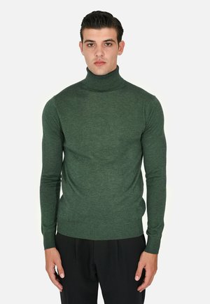 Maglione verde a collo alto realizzato in un morbido tessuto testurizzato. Design aderente con maniche lunghe e polsini e orlo a coste.